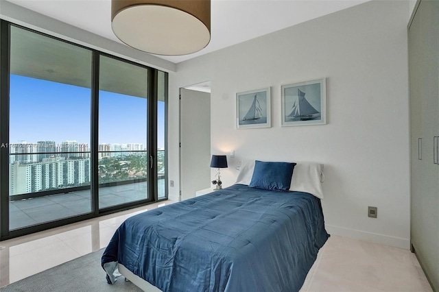 tiled bedroom with access to exterior