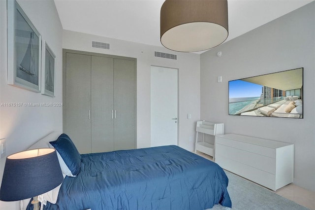 18975 Collins Ave Unit 2001, Sunny Isles Beach, FL 33160 - bedroom featuring a closet and carpet flooring