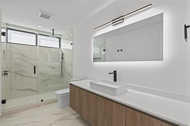 bathroom with vanity, toilet, and an enclosed shower