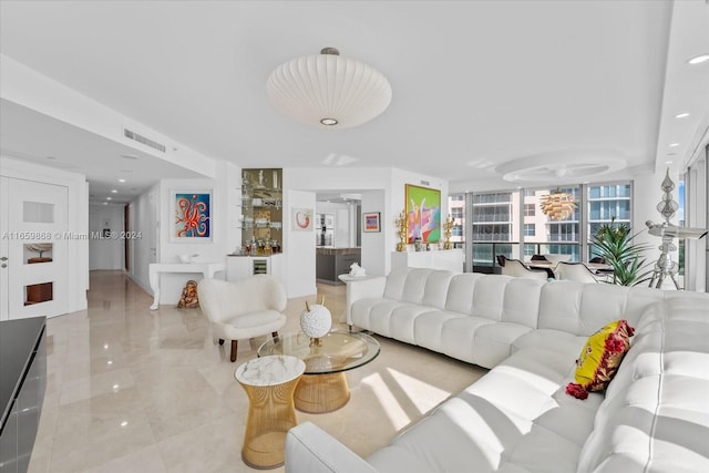 living room with ceiling fan