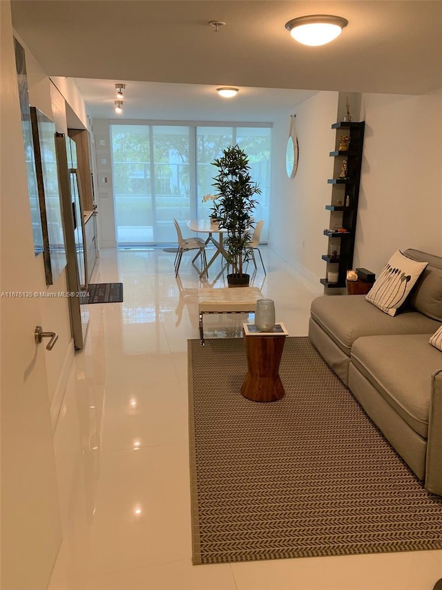 living room with light tile patterned floors