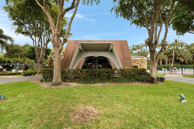 exterior space featuring a front lawn