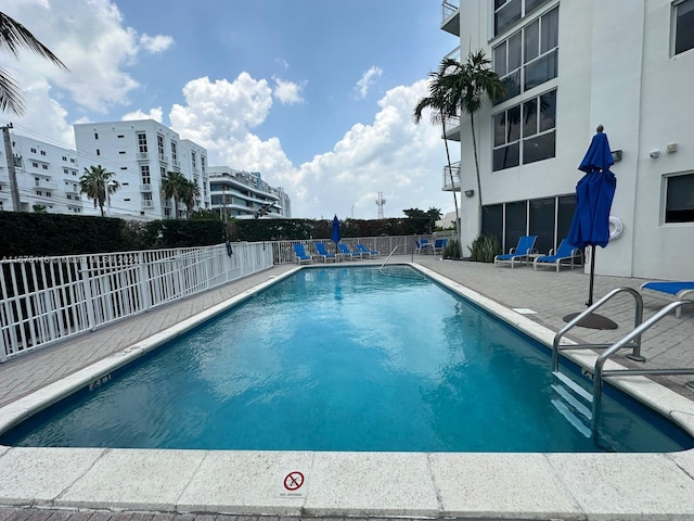 view of pool with a patio area