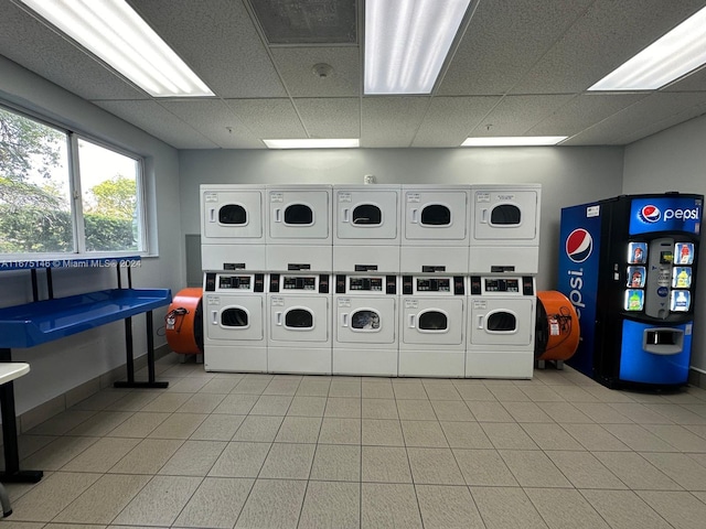 washroom featuring stacked washer and clothes dryer and separate washer and dryer