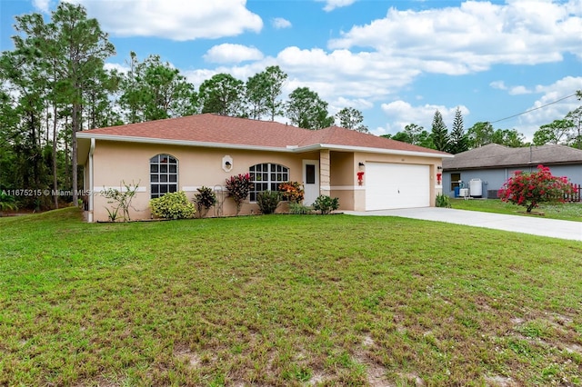 ranch-style home with a front yard and a garage