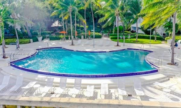 pool with a patio