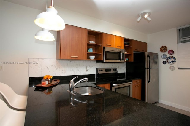 kitchen with dark countertops, appliances with stainless steel finishes, open shelves, and a sink