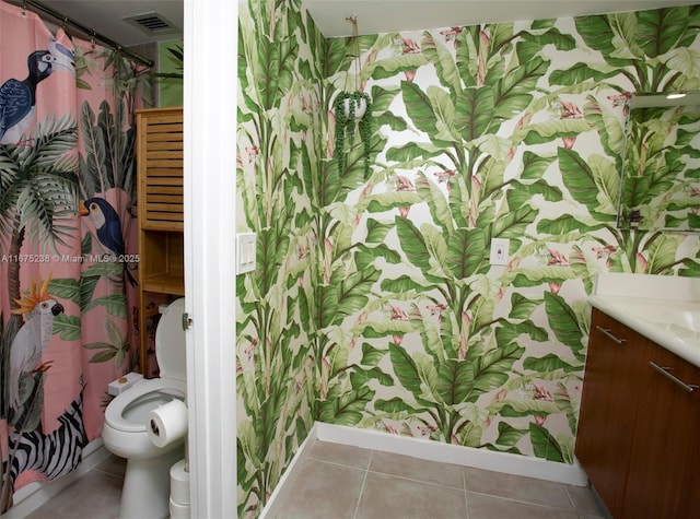 full bathroom with toilet, vanity, visible vents, and tile patterned floors