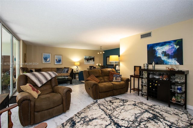 living room featuring a textured ceiling