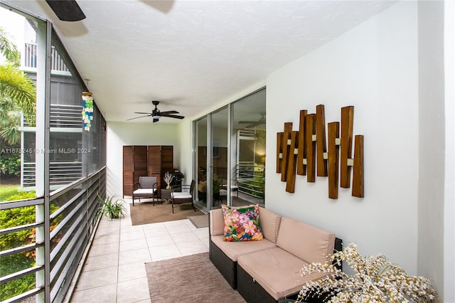 exterior space featuring ceiling fan