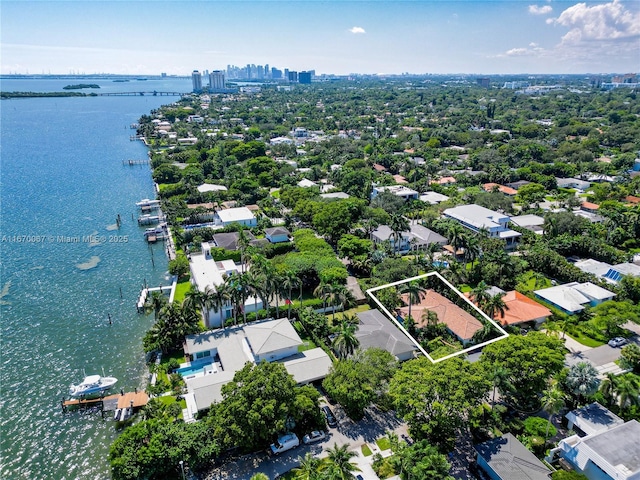 drone / aerial view with a water view