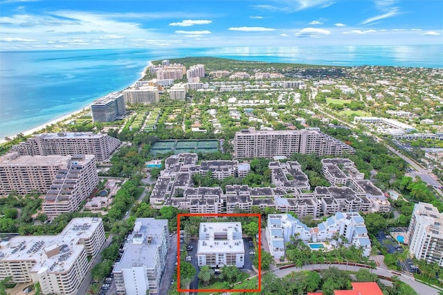 aerial view featuring a water view and a view of the beach