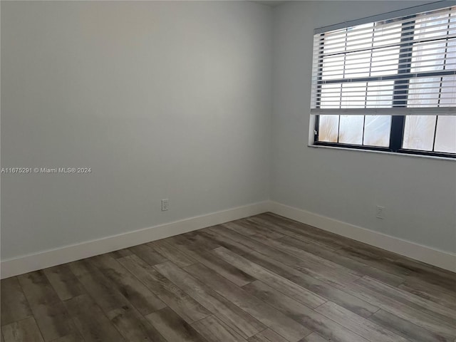 empty room featuring hardwood / wood-style floors