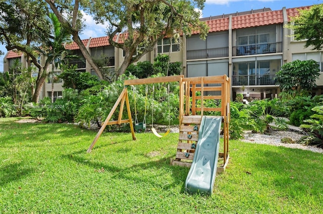 view of jungle gym featuring a yard