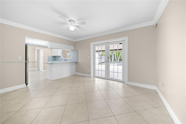 unfurnished living room featuring french doors, light tile patterned floors, ceiling fan, and ornamental molding