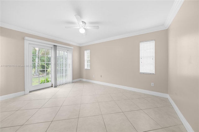 empty room with ceiling fan, light tile patterned flooring, and ornamental molding