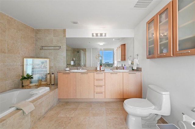 full bathroom with toilet, tile patterned floors, tile walls, shower with separate bathtub, and vanity