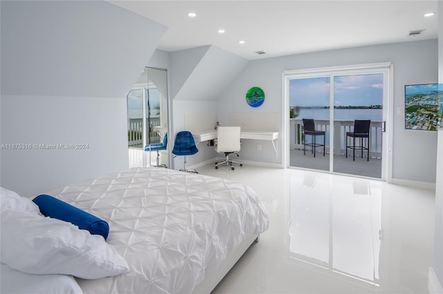 bedroom featuring access to exterior and vaulted ceiling