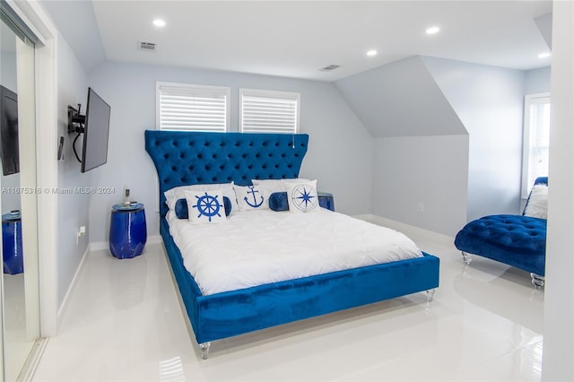 bedroom featuring lofted ceiling