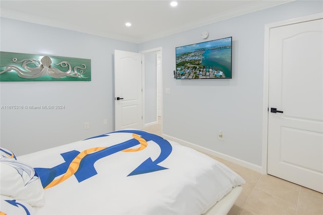 tiled bedroom with ornamental molding