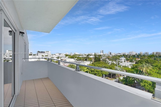 balcony featuring a city view
