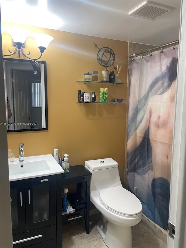 bathroom with tile patterned flooring, walk in shower, vanity, and toilet