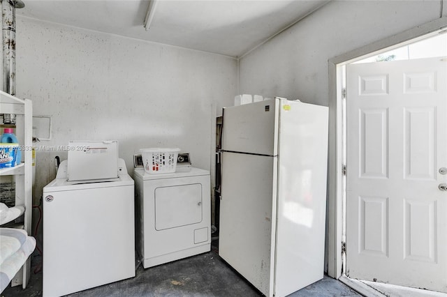 laundry room with separate washer and dryer