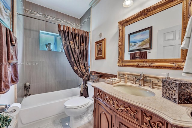 full bathroom featuring shower / bathtub combination with curtain, vanity, and toilet