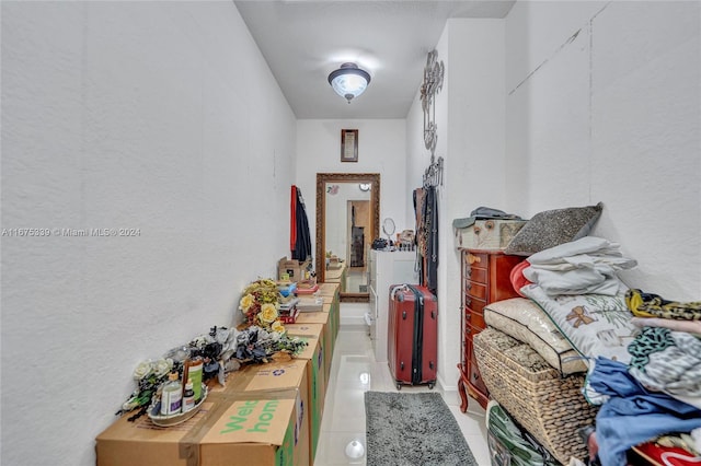 corridor with light tile patterned floors