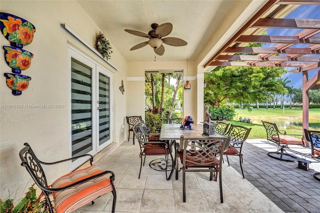 view of patio / terrace featuring a pergola and ceiling fan