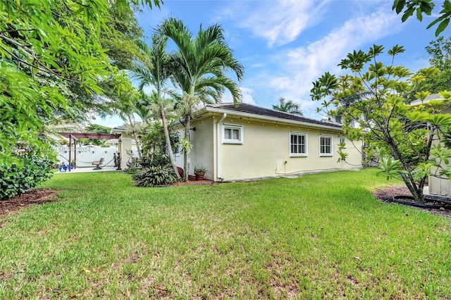 exterior space with a lawn