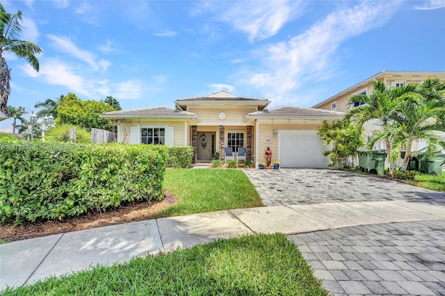 view of front of property with a garage