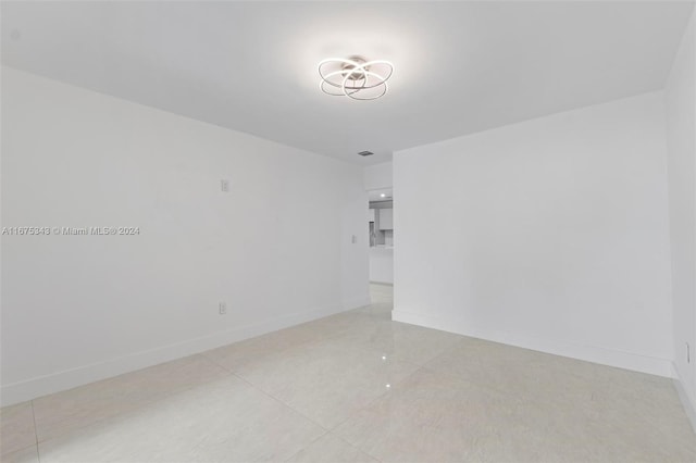 empty room featuring light tile patterned flooring