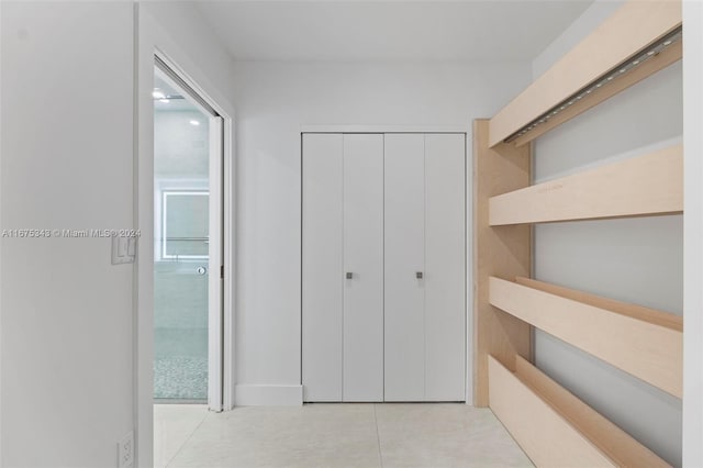 interior space with light tile patterned floors