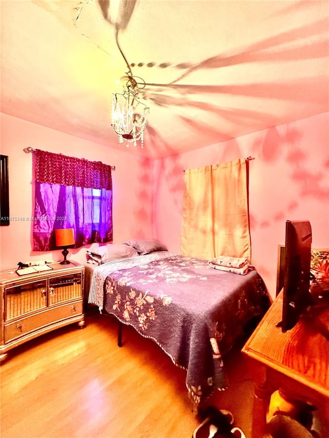 bedroom featuring wood-type flooring