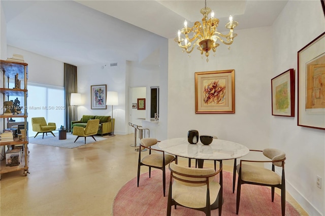 dining area with a chandelier