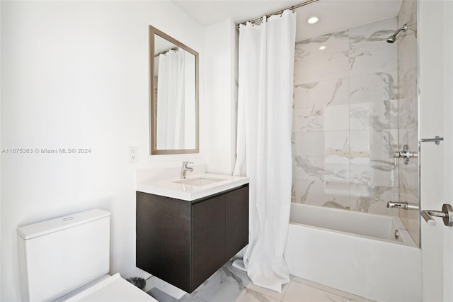 full bathroom featuring shower / bath combo with shower curtain, vanity, and toilet