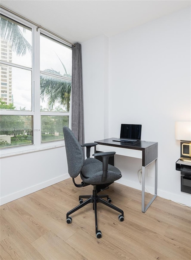 600 Three Islands Blvd Unit 214, Hallandale Beach, FL 33009 - office with wood finished floors and baseboards