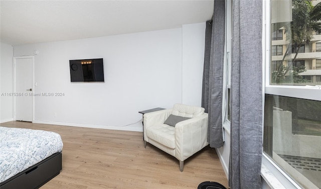 600 Three Islands Blvd Unit 214, Hallandale Beach, FL 33009 - bedroom with wood finished floors and baseboards