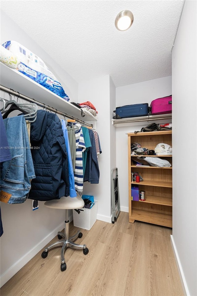 600 Three Islands Blvd Unit 214, Hallandale Beach, FL 33009 - spacious closet with wood finished floors