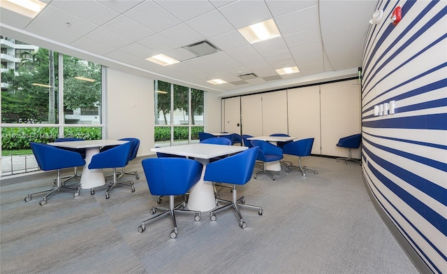 600 Three Islands Blvd Unit 214, Hallandale Beach, FL 33009 - home office with plenty of natural light, carpet flooring, and a drop ceiling