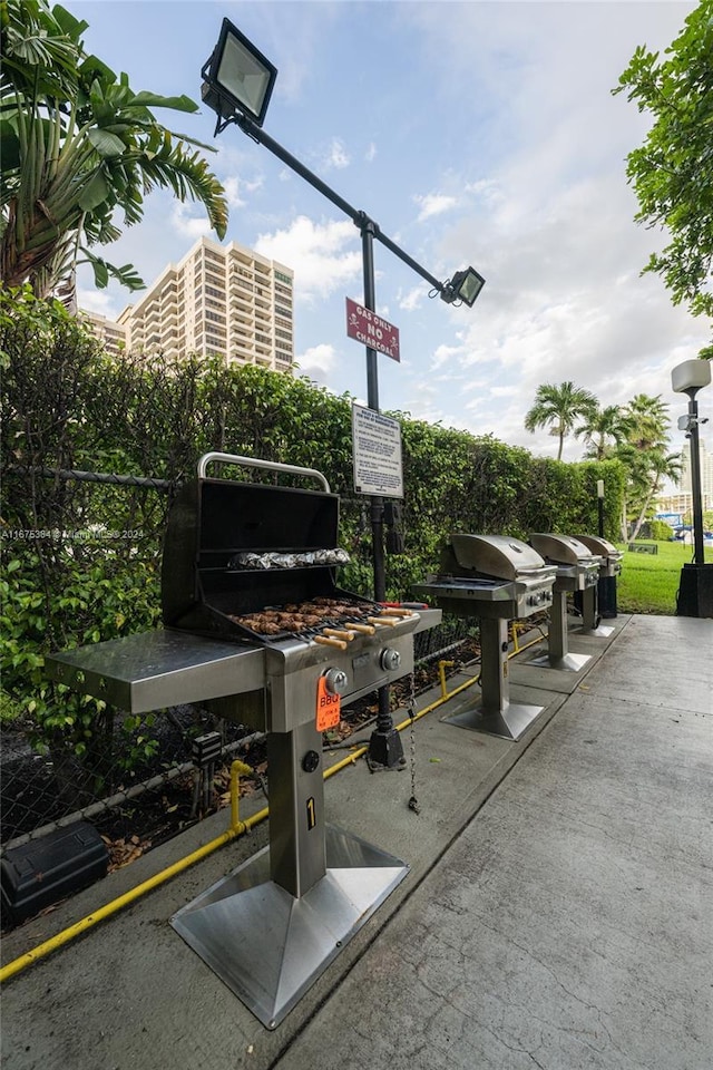 600 Three Islands Blvd Unit 214, Hallandale Beach, FL 33009 - view of patio with area for grilling