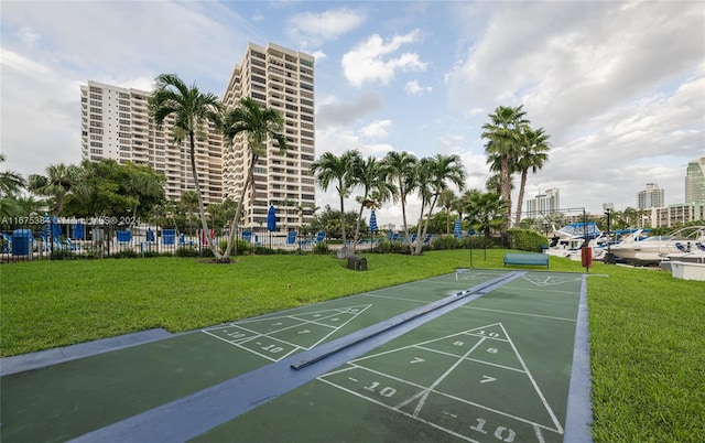 600 Three Islands Blvd Unit 214, Hallandale Beach, FL 33009 - view of home's community with shuffleboard and a city view