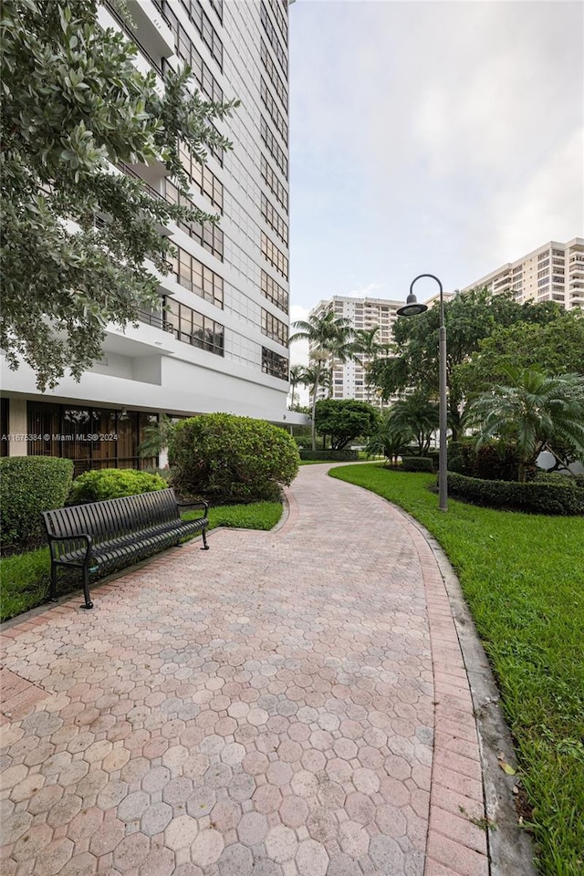 600 Three Islands Blvd Unit 214, Hallandale Beach, FL 33009 - surrounding community with a lawn
