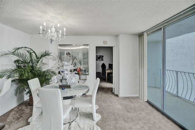 carpeted dining space featuring a textured ceiling and a notable chandelier