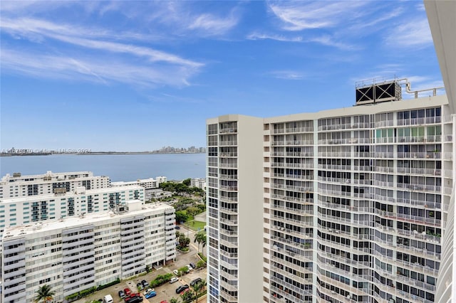 view of building exterior with a water view