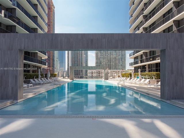 view of swimming pool featuring a patio area