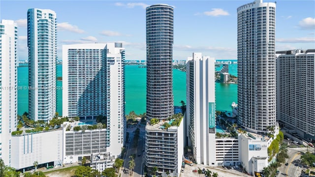 property's view of city featuring a water view