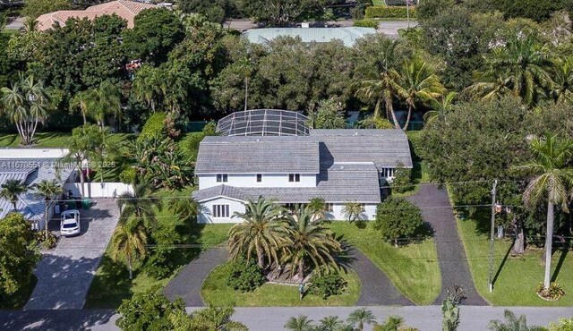 view of swimming pool with a lanai and a patio