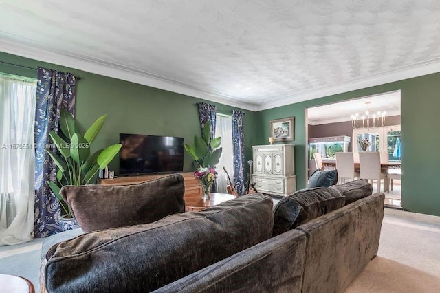 carpeted living room featuring plenty of natural light, ornamental molding, and a notable chandelier